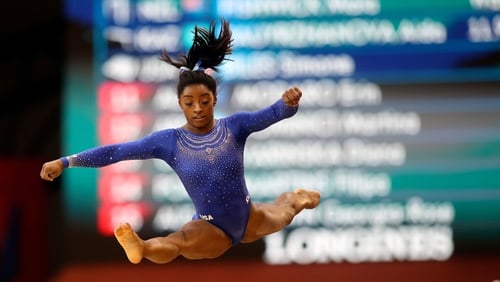 Simone Biles in action at the Doha arena