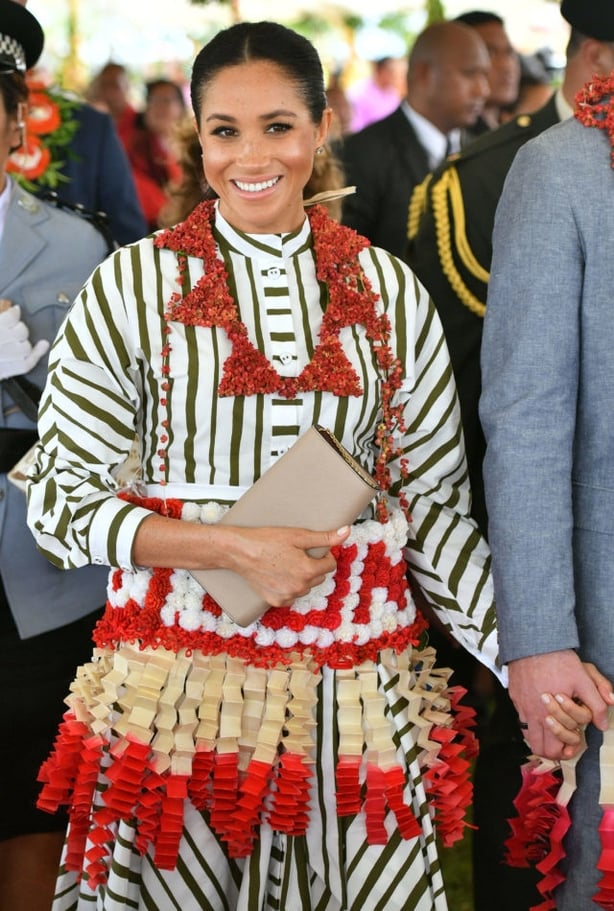 The Duchess of Sussex at an exhibition of Tongan handicrafts, mats and tapa cloths at the Fa'onelua Convention Centre (PA)