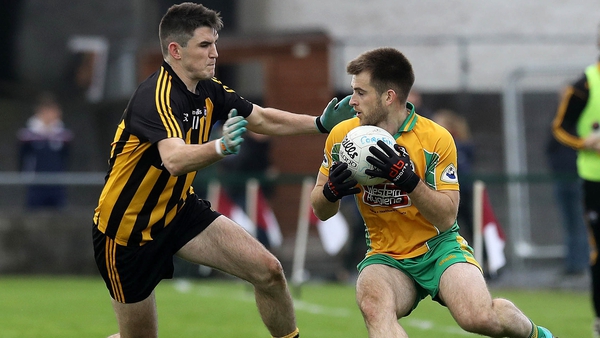 Corofin's Cathal Silke and Barry McHugh of Mountbellew-Moylough
