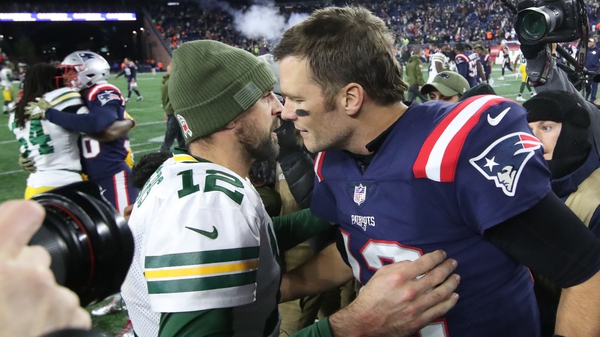 Tom Brady greets Aaron Rogers after the game