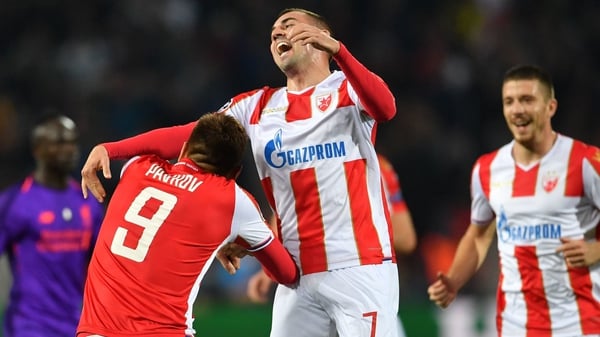 Red Star Belgrade's Serbian forward Milan Pavkov (L) celebrates his goal