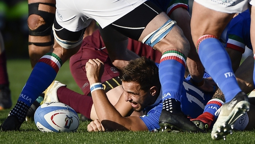Mattia Bellini of Italy presents the ball at the base of a ruck