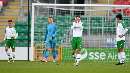 Dejected Ireland players after the final whistle