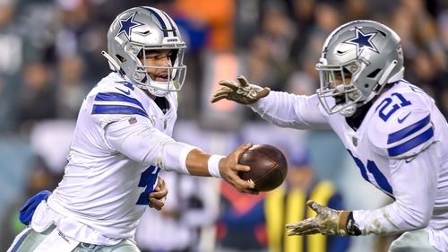 Dallas Cowboys quarterback Dak Prescott (4) hands off to running