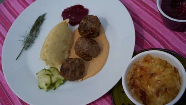 Janssons temptation with meatballs, potato-pureé, brown sauce, ligonberry jelly and pickled cucumber