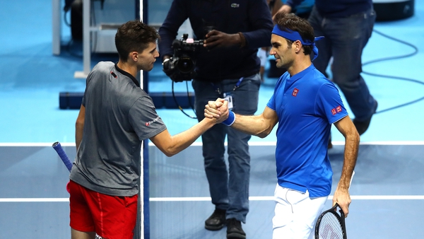 Roger Federer and Dominic Thiem after their match