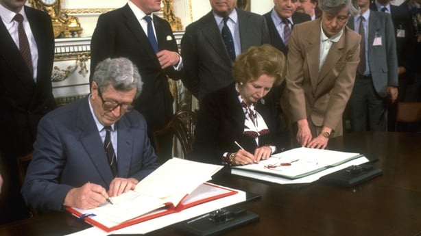 Colour photo of Fitzgerald and Thatcher signing the agreement