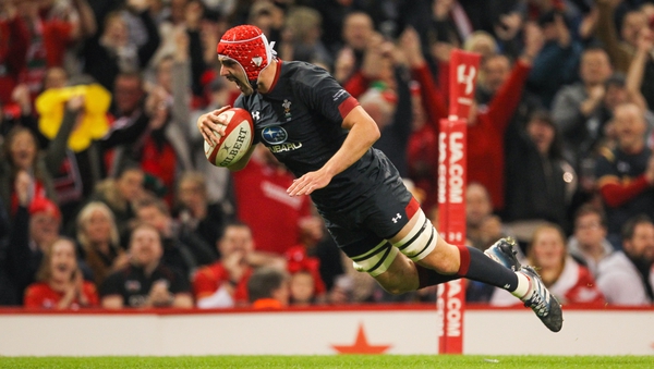 Cory Hill of Wales dives in for his sides seventh try