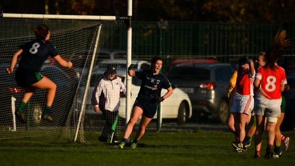 Róisín McGovern of Foxrock-Cabinteely (C) celebrates scoring her side's last-minute goal