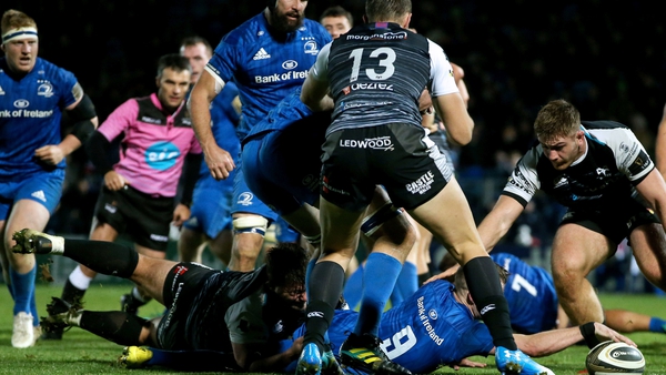 Nick McCarthy stretches out for one of Leinster's seven tries against Ospreys
