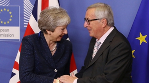 Theresa May greeted by EU Commission President Jean-Claude Juncker in Brussels