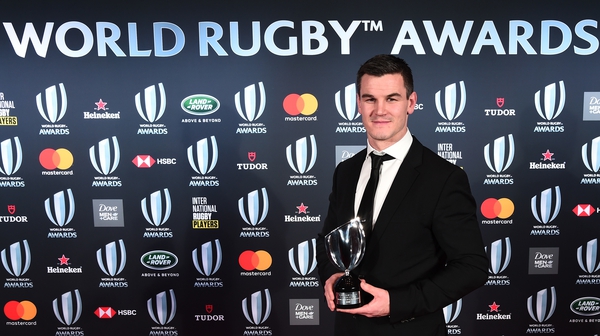 Johnny Sexton poses with the World Rugby Player of the Year award