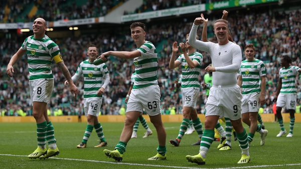 Celtic players celebrate their September defeat of Rangers