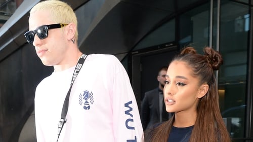 Ariana Grande says she has "irrevocable love" for Pete Davidson as she urges her fans to "be gentler with others."