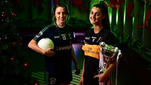 Eimear Meaney (R) of Mourneabbey poses with the Dolores Tyrrell Memorial Cup, alongside Amy Ring, captain of Foxrock-Cabinteely