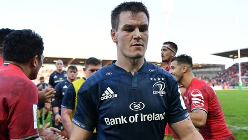 Johnny Sexton walks off in Toulouse after a rare European defeat