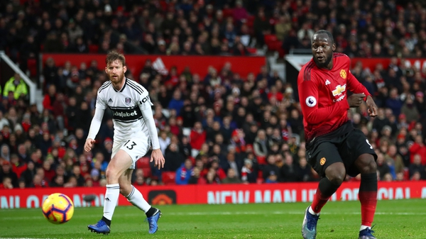 Romelu Lukaku slots home United's third goal