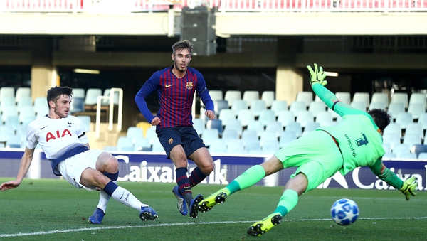 Troy Parrott scores the opening goal against Barcelona