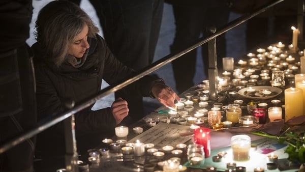 Tributes, flowers and candles were left for the dead and injured after last night's attack