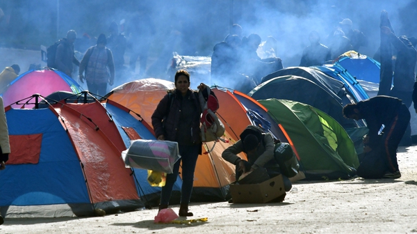 Migrants pictured in a camp at Velika Kladusa earlier this year