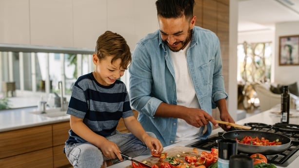 father and son cooking