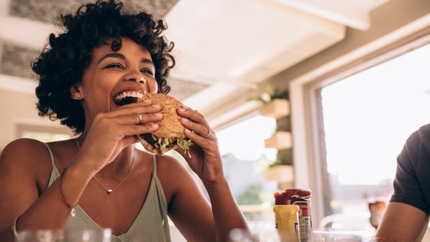 woman eating a burger