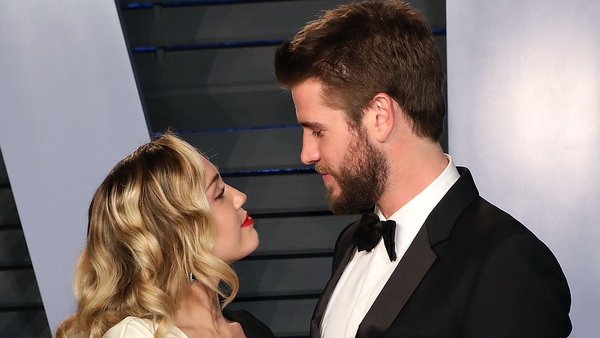 Miley Cyrus and Liam Hemsworth (pictured at the Vanity Fair Oscars party in March) - The couple are reported to have wed in a small ceremony in Tennessee