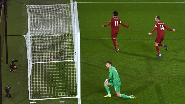 Salah celebrates scoring his penalty against Newcastle