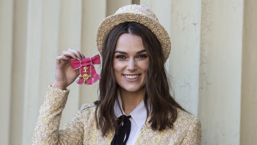 Keira Knightley pictured after receiving her OBE