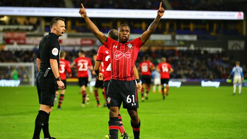 Michael Obafemi celebrates his first Premier League goal against Huddersfield