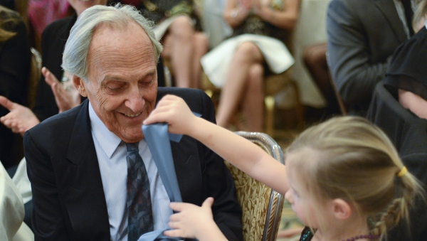 Norman Gimbel pictured with his granddaughter in 2013