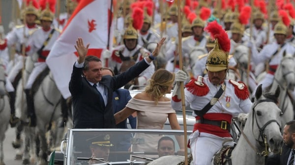 Jair Bolsonaro with his wife Michelle Bolsonaro ahead of the swearing in ceremony