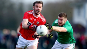 James Loughrey of Cork and Limerick's Brian Fanning