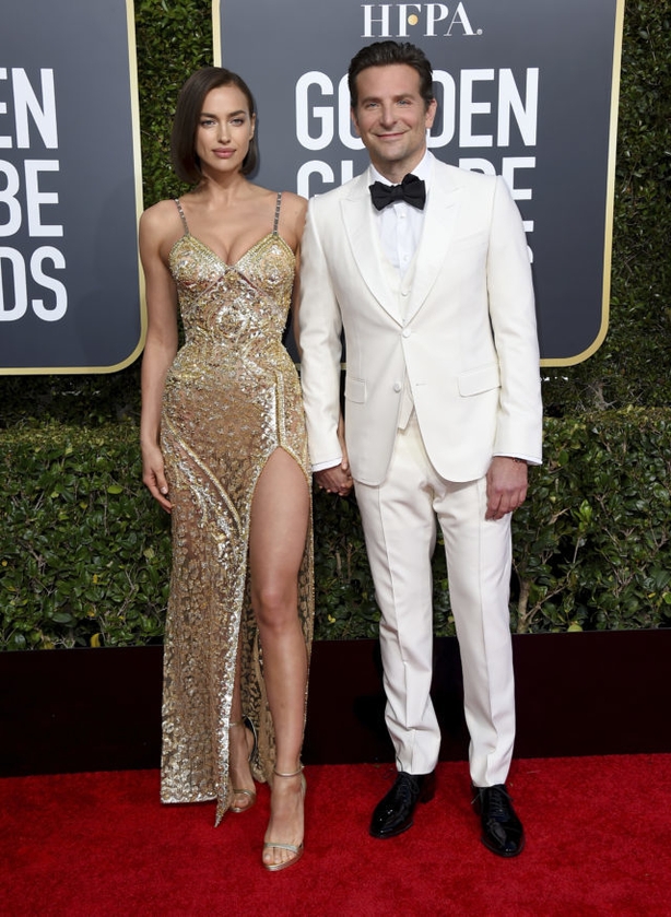 Irina Shayk, left, and Bradley Cooper arrive at the 76th annual Golden Globe Awards (Jordan Strauss/AP)