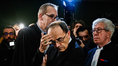 Cardinal Philippe Barbarin arrives at court in Lyon