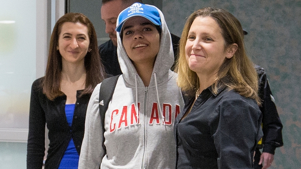 Rahaf Mohammed Al-Qunun is met by Canadian Foreign Affairs Minister Chrystia Freeland at the airport in Toronto