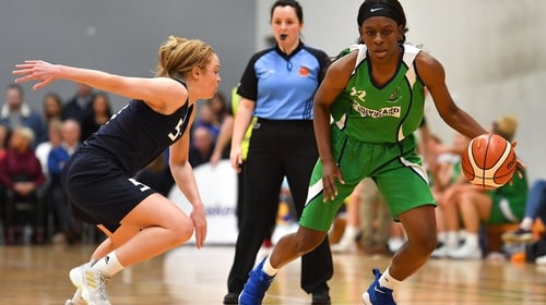 Briana Green of Courtyard Liffey Celtics in action against Sarah Woods of DCU Mercy