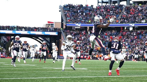 Matthew Slater of the New England Patriots downs a punt during the fourth quarter