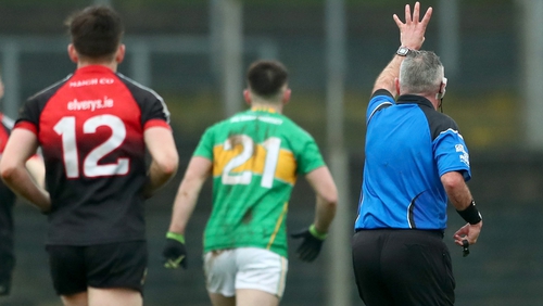 Referee James Molloy awards Leitrim a free as he signals that Mayo performed four hand-passes