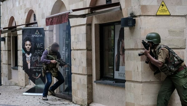 Photographs from the scene showed the SAS soldier (L) entering the complex in Nairobi