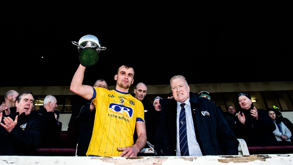Enda Smith lifting the trophy after Roscommon's victory.