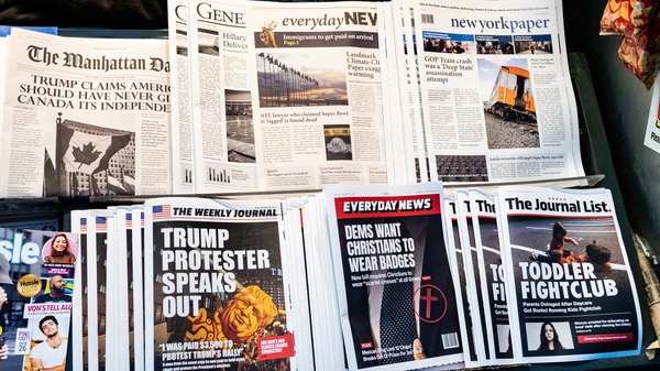 Newspapers containing fake headlines and stories displayed on a New York newsstand by the Columbia Journalism Review to educate news consumers about the dangers of misinformation. Photo: Michael Brochstein/SOPA Images/LightRocket via Getty Images