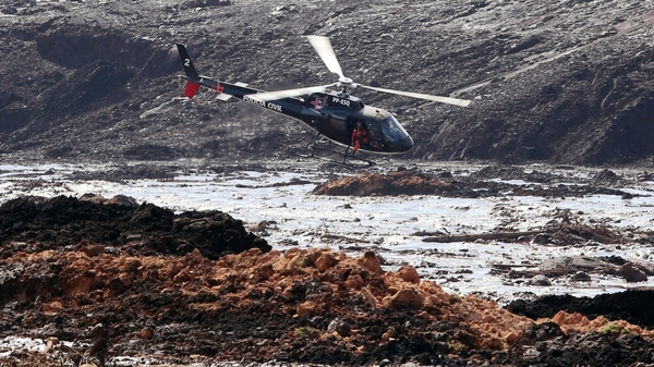 The river of mud covered vegetation and farmland, damaging and destroying houses
