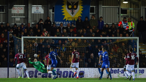 AFC Wimbledon sprung the surprise of the fourth round with a win over West Ham