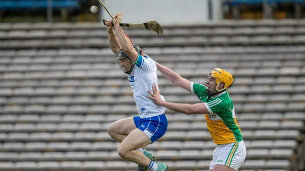Waterford's Mikey Kearney with Pat Camon of Offaly