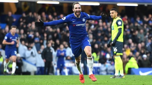 Gonzalo Higuain celebrates as he scores on his first Chelsea goals