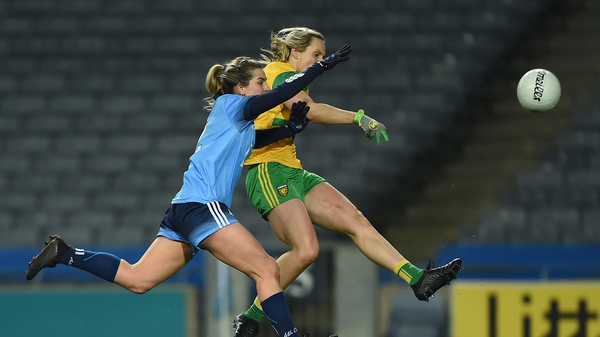 Donegal's Karen Guthrie scores a point despite pressure from Dublin defender Martha Byrne at Croke Park