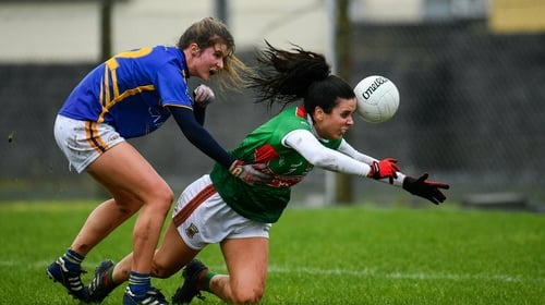 Mayo's Noirin Moran fights for the ball with Laura Dillon of Tipperary