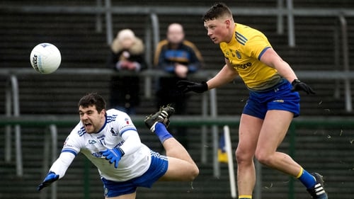 Conor Cox in action against Monaghan's drew Wylie
