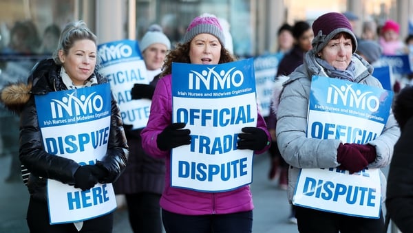 Nurses take part in their third day of industrial action over pay and conditions outside the Mater Hospital in Dublin